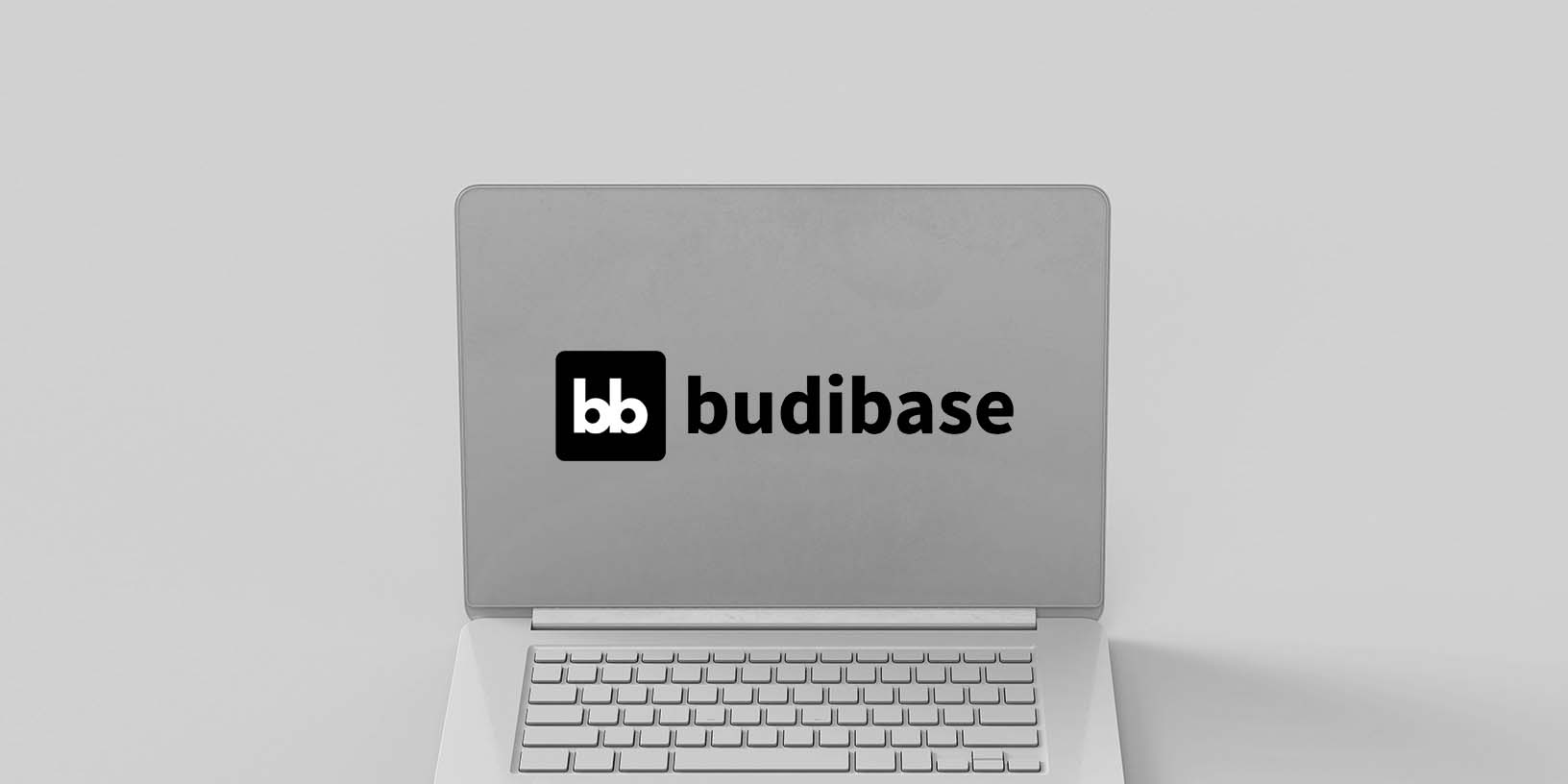 laptop illustration mit Budibase logo