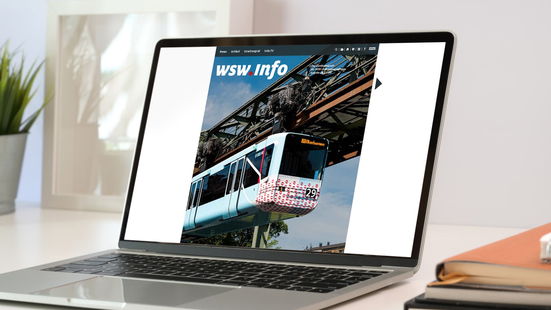 Kundenmagazin der Wuppertaler Stadtwerke wird auf dem Bildschrim eines Laptops angezeigt